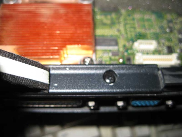 Hidden screws under sticker